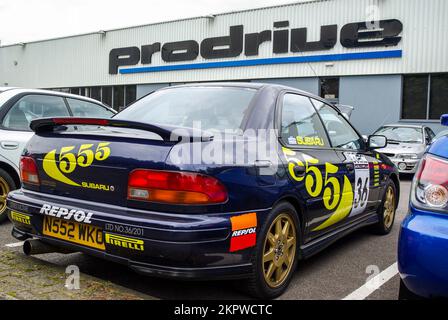 McRae Gathering of Subaru Imprezas. Anniversary of the death Colin McRae event, with around 1200 cars involved. 1990s copy 555 rally car at Prodrive Stock Photo