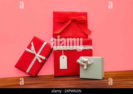 Close-up of a stack of wrapped gifts on a table Stock Photo