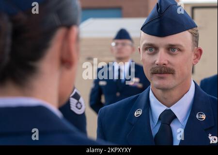 Members of the 162nd Logistics Readiness Squadron wait in formation ...