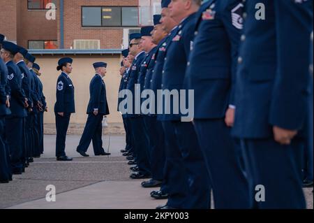 Open Ranks Inspection Guide Members of the 162nd Logistics Readiness Squadron wait in formation ...