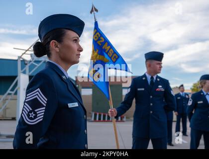 Open Ranks Inspection Guide Members of the 162nd Logistics Readiness Squadron wait in formation ...