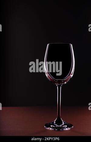 Empty wine glass on black background Stock Photo
