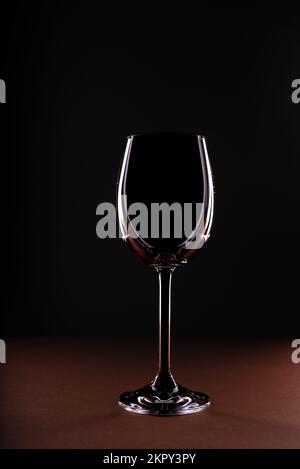 Empty wine glass on black background Stock Photo