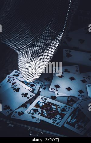 Blue toned gaming still-life scene on a poker set in dramatic vegas style. Art of a betting man Stock Photo