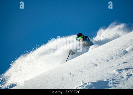 Man skiing in deep powder snow, Zauchensee, Salzburg, Austria Stock Photo