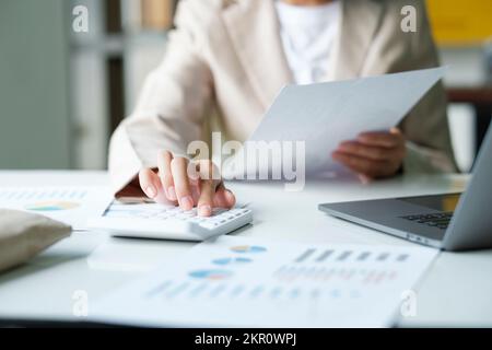 Close up of businesswoman working at office using laptop. Stock Photo