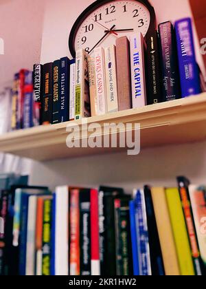 Bookshelves filled with hardback and paperback books, 2022, United States Stock Photo