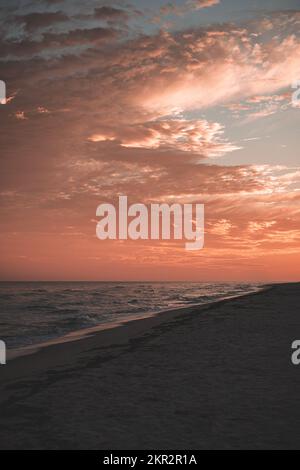 An Image of a Beach Front During an Incredible Sunset Filled with Color Stock Photo
