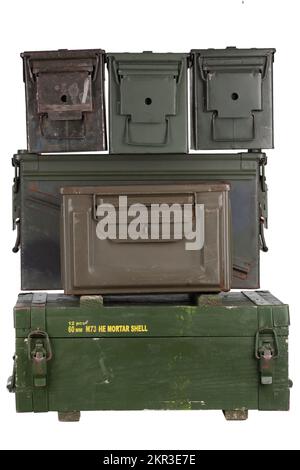 Stack of US army ammo cans and army green crate isolated on white background Stock Photo