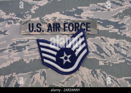 August 31, 2020. US AIR FORCE branch tape and Staff Sergeant rank patch on digital tiger-stripe pattern Airman Battle Uniform (ABU) Stock Photo