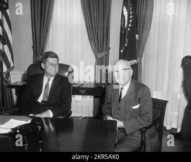 Photograph of Harry S. Truman and President John F Kennedy in the Oval Office. Stock Photo