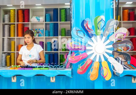 Dubai, UAE, February 23, 2018: Beach flip flop shop at the Jumeirah Beach Residence (JBR) Walk - a polular destination for food, shopping and entertai Stock Photo