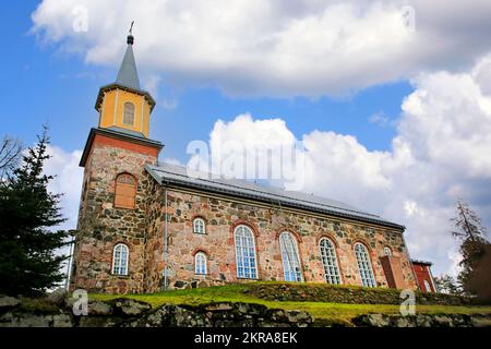 Karjalohja Church in Karjalohja, Finland is a greystone church completed in 1860, designed by Jean Wiik. February 2020. Stock Photo
