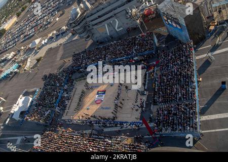 221111-N-EV253-1247 SAN DIEGO (Nov. 11, 2022) – An MH-60S Knighthawk, assigned to the 'Merlins' of Helicopter Sea Combat Squadron (HSC) 3, participates in a commemorative flyover of the Nimitz-class aircraft carrier USS Abraham Lincoln (CVN 72) during the Armed Forces Classic, Carrier Edition 2022. During the event, which was held on Veteran's Day, a basketball court was constructed on Lincoln's flight deck, and the Gonzaga Bulldogs played against the Michigan State Spartans. HSC-3 is the Navy's West Coast MH-60S fleet replacement squadron, responsible for training pilots and aircrewmen by pro Stock Photo