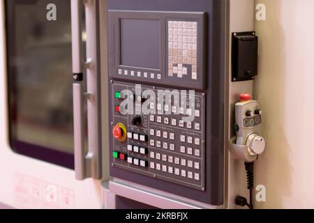 Control panel of modern industrial CNC machine. Selective focus. Stock Photo