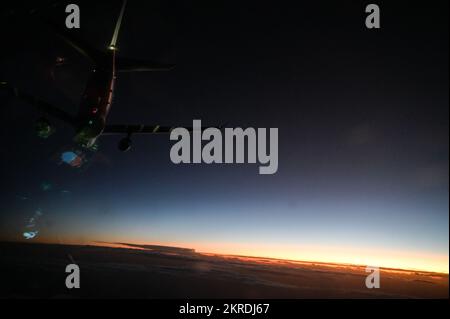 A Royal Australian Air Force KC-30A Multi-Role Tanker Transport (MRTT) prepares to perform aerial refueling with a U.S. Air Force C-17 Globemaster III assigned to the 535th Airlift Squadron during Exercise Global Dexterity in the skies over Queensland, Nov. 14, 2022. Exercise Global Dexterity 2022 is being conducted at RAAF Base Amberley, and is designed to help develop the bilateral tactical airlift and airdrop capabilities of the United States Air Force (USAF) and the Royal Australian Air Force (RAAF). Both the United States and Australia rely on the C-17A to provide strategic and tactical a Stock Photo