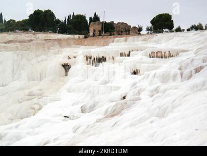 Denizli, Turkey - Sept 2017: View of natural travertine pools and terraces in Pamukkale. Cotton castle in southwestern Turkey Stock Photo