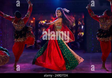 Gujrati woman performing Garba on stage Stock Photo