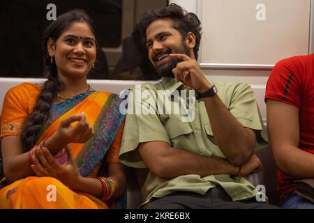 Young couple travelling in metro train Stock Photo