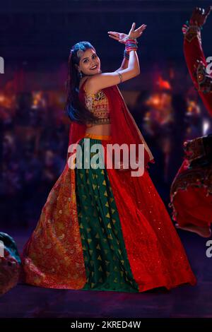 Gujrati woman performing Garba on stage Stock Photo