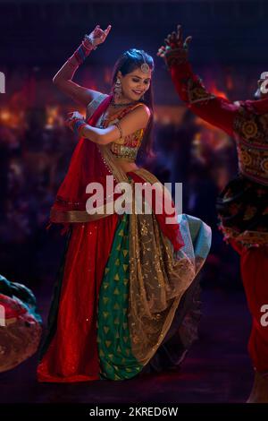 Gujrati woman performing Garba on stage Stock Photo