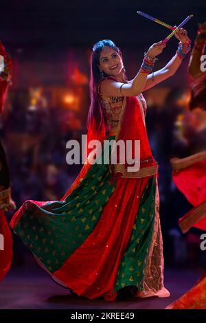 Gujrati woman performing Garba on stage Stock Photo