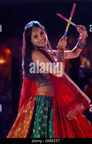 Gujrati woman performing Garba on stage Stock Photo