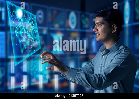 Digitally enhanced shot of a  technician/businessman working with virtual reality projection Stock Photo