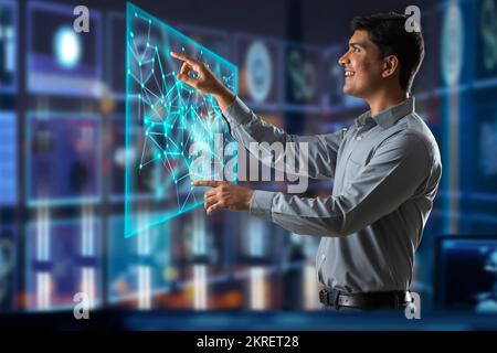 Digitally enhanced shot of a  technician/businessman working with virtual reality projection Stock Photo