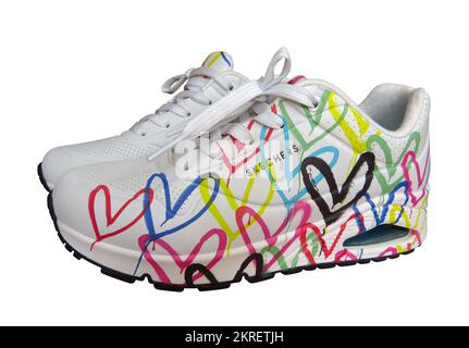 Almaty, Kazakhstan - November 20, 2022:  SKECHERS Los Angeles sports shoes with colorful hearts for women, on white background. Stock Photo