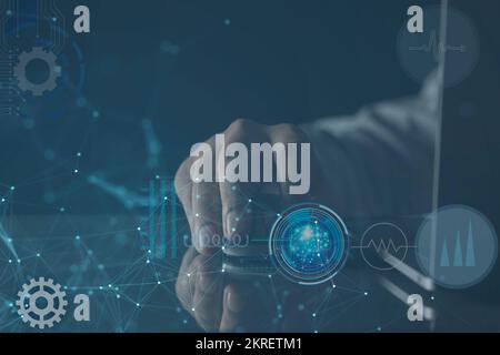 Software engineer coding on laptop computer with innovation technology interface Stock Photo