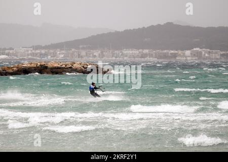 People practising kitesurfing in Playa de Muro, Mallorca, Spain, during ...
