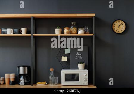 Modern office kitchen for lunch and coffee break with kitchen utensils and modern appliance Stock Photo