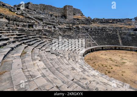 Milet, Aydın, Turkey, Sep. 2021: Ruins of antique Greek theatre in Miletus on western coast of Anatolia in ancient Caria Stock Photo