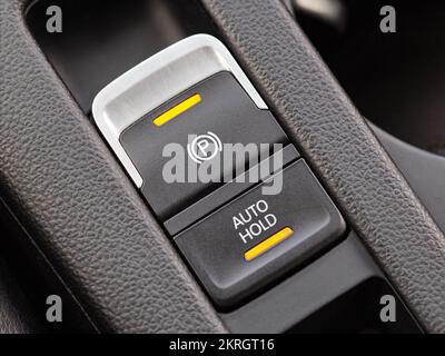 Modern handbrake parking brake system in the car and auto hold Stock Photo