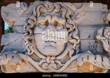Didim, Aydin, Turkey- August 23, 2021: Detail of stone carved Medusa head in Apollo Temple, Didyma, The famous Medusa figure Stock Photo