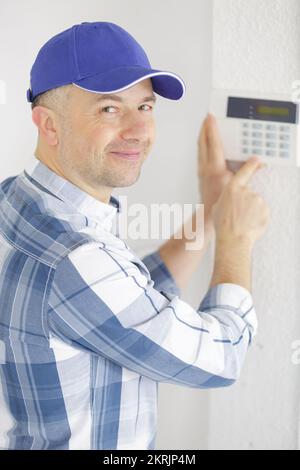 technician working on setting panel Stock Photo
