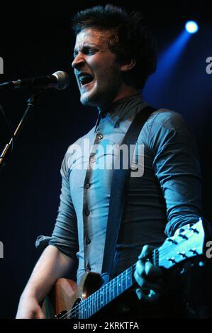 ROSS MILLARD, FUTUREHEADS, YOUNG, 2005: Ross Millard, singer and guitarist of the Futureheads on the NME Tour at Cardiff University, February 6 2005. Photograph: ROB WATKINS.  INFO: The Futureheads are a British rock band formed in 2000 in Sunderland. Known for their energetic, post-punk revival sound and catchy melodies, they gained prominence with their self-titled debut album and hits like 'Hounds of Love,' becoming influential in the indie rock scene. Stock Photo