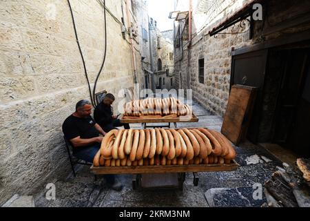 Fresh Ka’ek Al-Quds - Sesame bagel bread being delivered on a traditional cart to various shops in the Old city of Jerusalem. Stock Photo