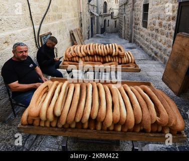 Fresh Ka’ek Al-Quds - Sesame bagel bread being delivered on a traditional cart to various shops in the Old city of Jerusalem. Stock Photo