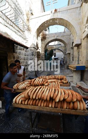 Fresh Ka’ek Al-Quds - Sesame bagel bread being delivered on a traditional cart to various shops in the Old city of Jerusalem. Stock Photo