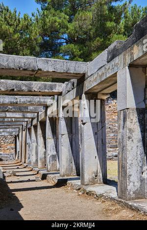 Priene, Söke, Aydın, Turkey, Sep. 2021: Ruins of the ancient city of Priene, Ruins of ancient theatre skene in Priene Stock Photo