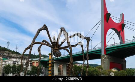 Spider sculpture called mama next to La Salve bridge in Bilbao, Basque Country, Spain Stock Photo