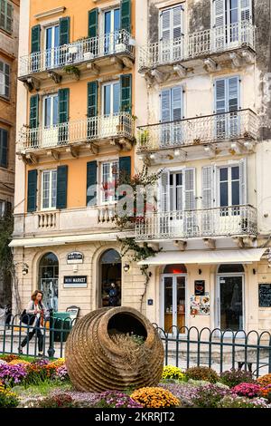 Terracotta pot in front of old buildings, Corfu Old Town, Greece Stock Photo