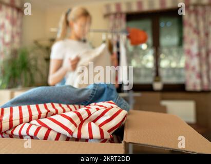Pre owned clothes resale or donation. Stock Photo