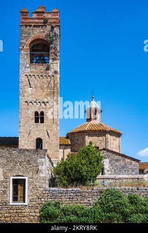 Bell tower and capocroce of Basilica di Sant'Agata on Piazza della Basilica in Asciano in the Crete Senesi, Province of Siena, Tuscany, Italy Stock Photo