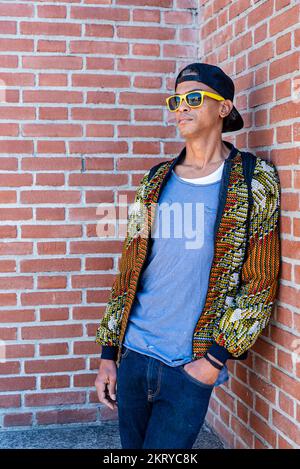 portrait of young adult african american man, street style Stock Photo
