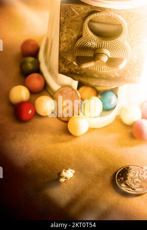 Old corner store photograph on a classic childrens gumball vending machine with coin slot lolly balls and Australian 20 cent pieces Stock Photo