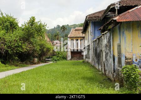 Ipoh, Perak, Malaysia - November 2012: A vintage colonial era house with a green garden in the village of Papan near Ipoh in Malaysia. Stock Photo