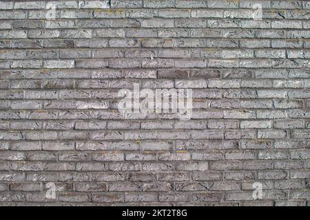 A background of a wall of gray ornamental stone Stock Photo